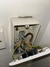 Old isolator, notice the burnt remnants in the bottom of the pattress box.